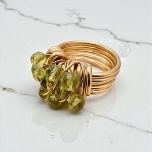 Gold Tone Wire Wrapped Ring with Faceted Chartreuse Colored Stones